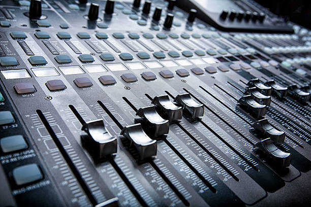 Digital Live Mixing Sound Console State of the art digital mixing console used for live performance and sound mixer photos stock pictures, royalty-free photos & images