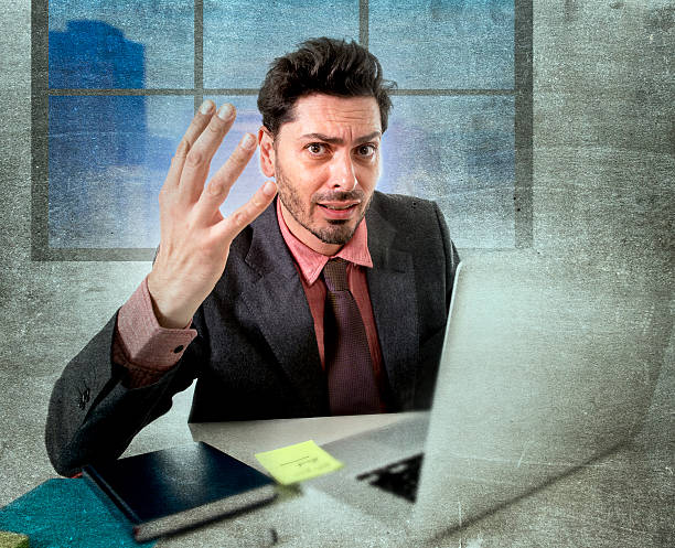 istock businessman with headache working on computer desperate in work stress 500843052
