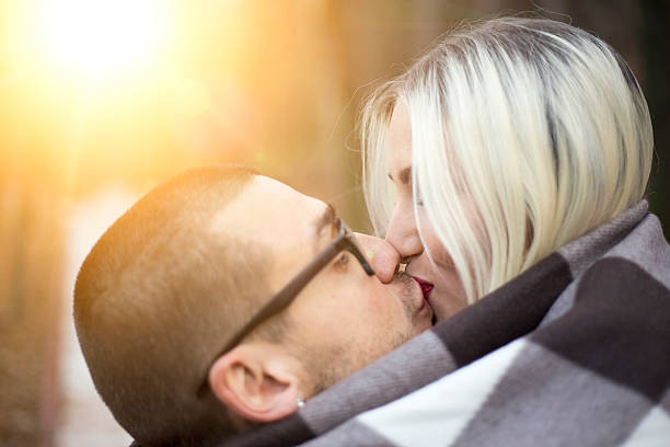 istock Couple kissing outside 500845012
