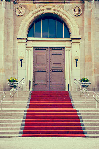 istock iron doors and red carpet entrance 500847625