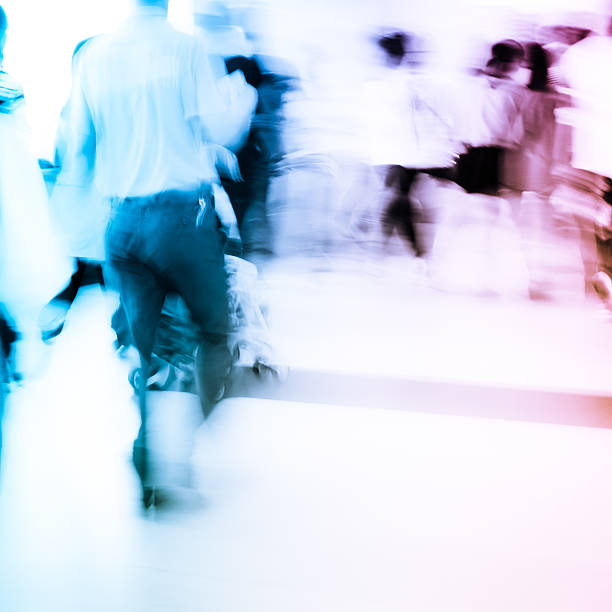 istock group of blur passengers, walking at subway station. 500848079