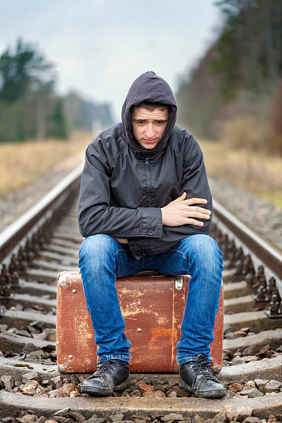 istock Teenage boy with a suitcase 500848349