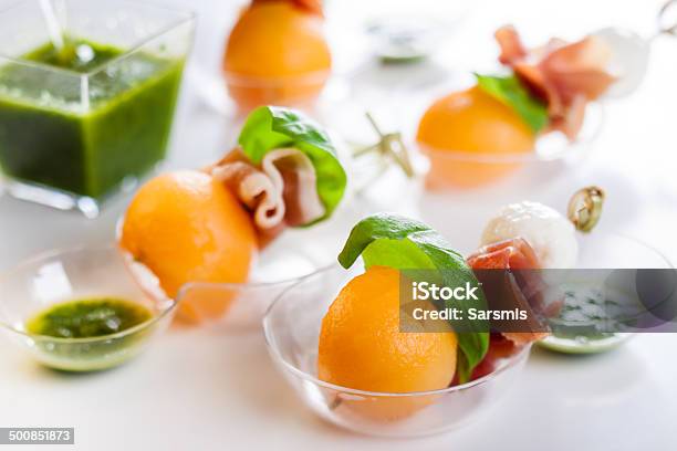 Melonmozzarella And Prosciutto On Skewers Stock Photo - Download Image Now - Cheese, Ham, Skewer