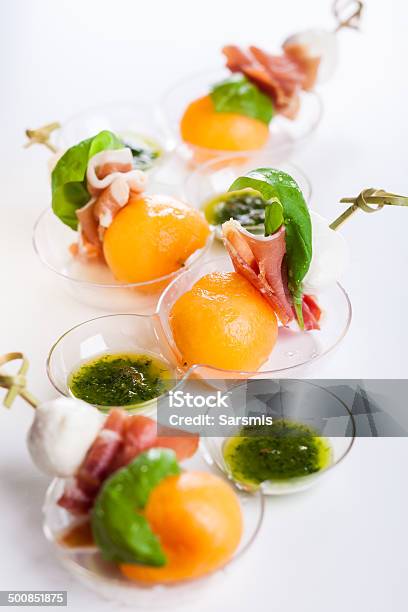 Melon Mozzarella And Prosciutto On Skewers Stock Photo - Download Image Now - Skewer, Melon, Mozzarella