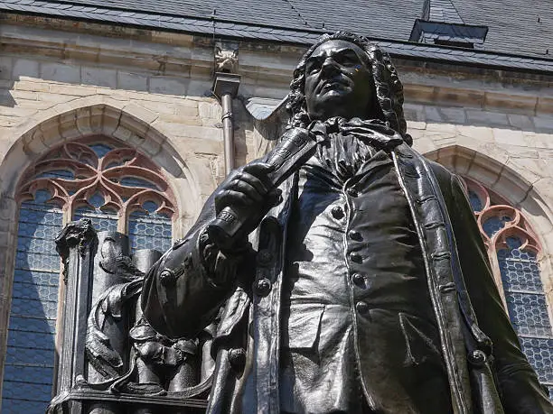 The Neues Bach Denkmal meaning new Bach monument stands since 1908 in front of the St Thomas Kirche church where Johann Sebastian Bach is buried
