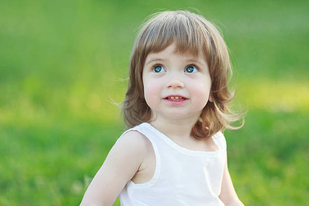 Beautiful Little Girl Smiling Stock Photo - Download Image Now - Baby -  Human Age, Baby Girls, Beautiful People - iStock