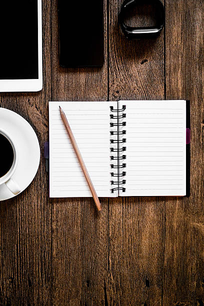istock desktop with digital tablet,coffee and office supplies 500870074