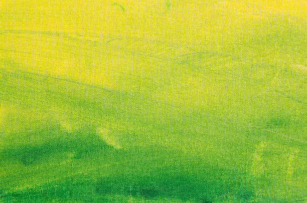 green and yellow  painted artistic canvas background stock photo