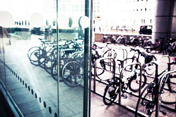 Financial District office and cycles outdoor on sidewalk in London Canary Wharf.