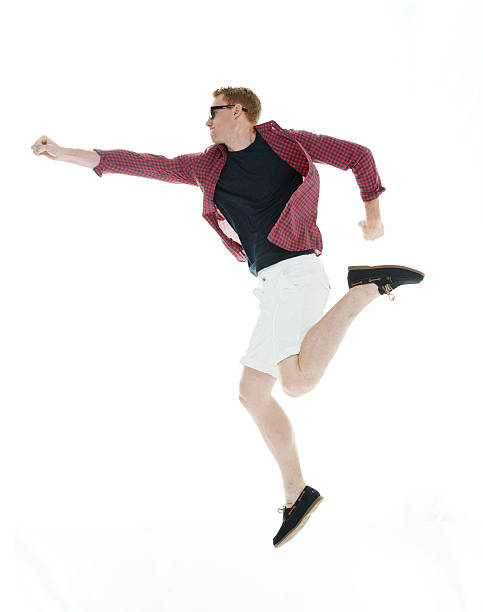 istock Man jumping with fist out stretch 500871951