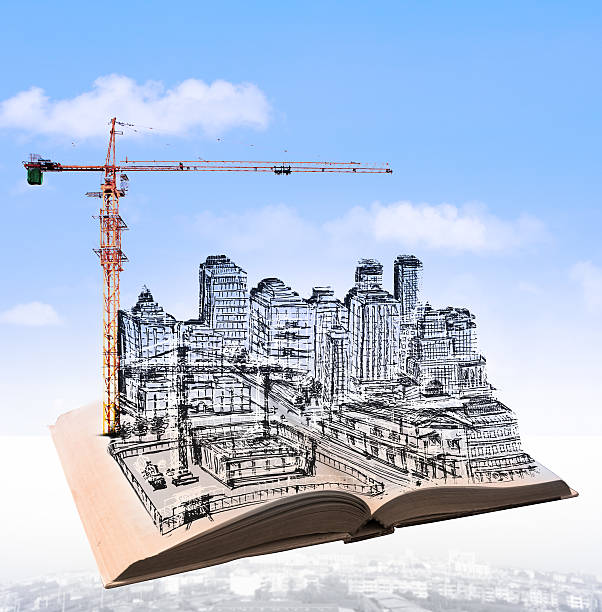istock sketching of building construction on flying book 500872615