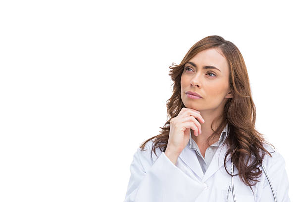 istock Concentrated pretty doctor posing 500874091
