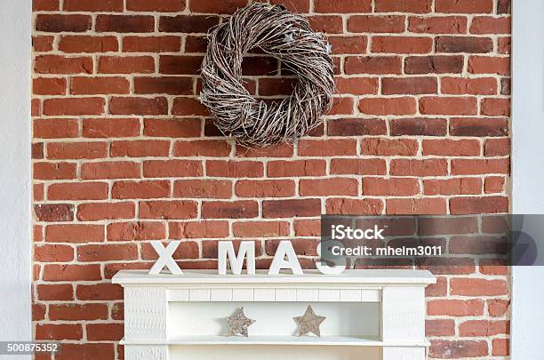 Decorated Christmas Fireplace On A Brick Wall Stock Photo - Download Image Now - Arts Culture and Entertainment, Brick, Brick Wall