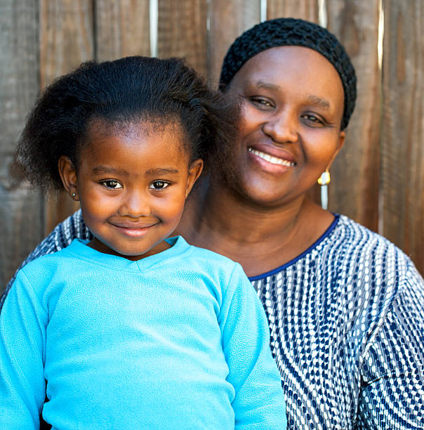 istock African kid with mother. 500875423