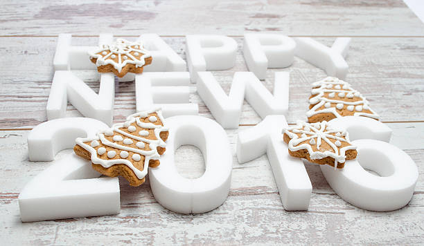 istock New YearGingerbread cookies composition on vintage wooden table background. 500876940