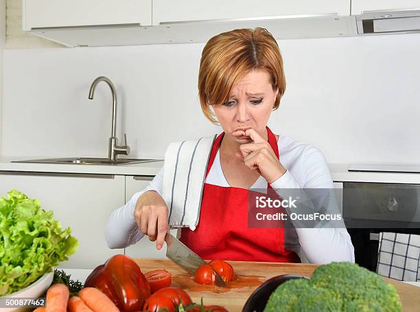 Home Cook Woman Suffering Domestic Accident Knife Cutting Finger Stock Photo - Download Image Now