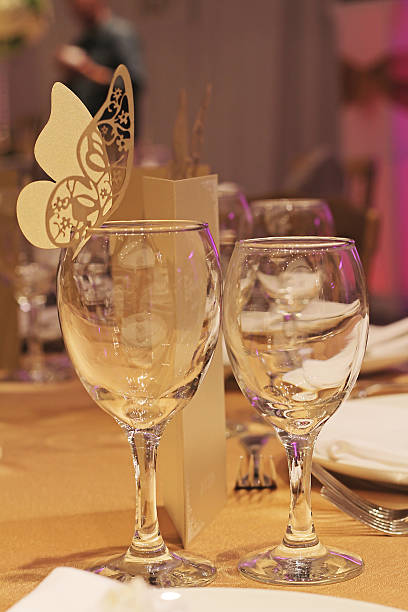 istock Two Wine glasses and Paper Butterfly decoration. 500878912