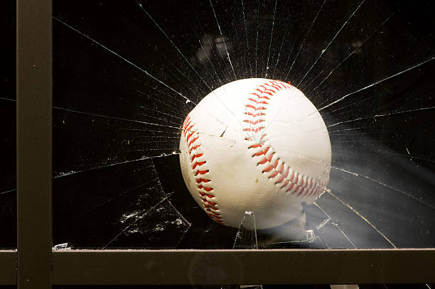 baseball attraverso una finestra. - baseballs baseball breaking broken foto e immagini stock