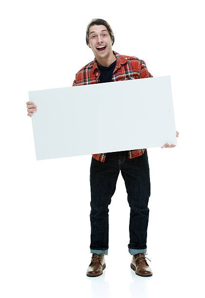 istock Cheerful hipster holding placard 500882224