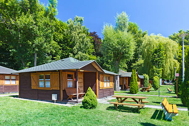 Holiday Cottages Small holiday cottages  at summer camping summer camp cabin stock pictures, royalty-free photos & images