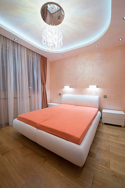 istock Interior of a modern bedroom with luxury ceiling 500884734