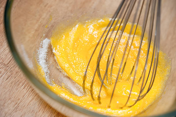 istock whipping yok eggs and sugar together 500885167