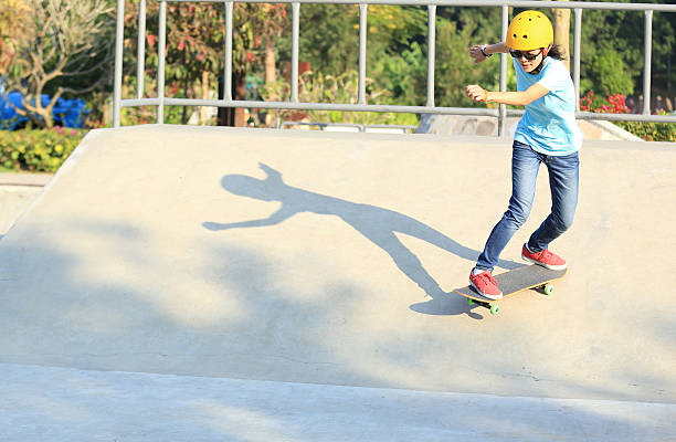 istock skateboarding woman at skatepark 500885382