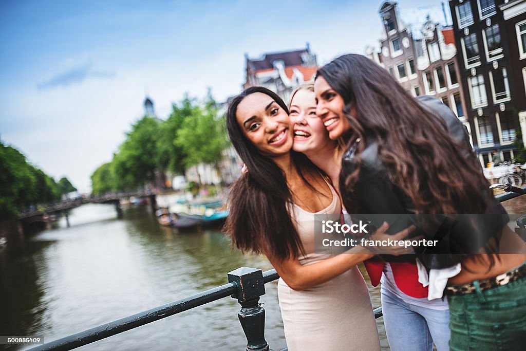 friends happiness in amsterdam http://blogtoscano.altervista.org/amtu.jpg Amsterdam Stock Photo