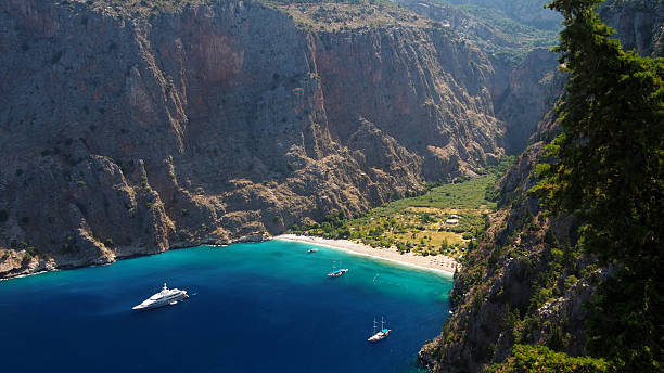 Butterfly Valley The Butterfly Valey in the city of Oludeniz/Fethiye in western Turkey. sunning butterfly stock pictures, royalty-free photos & images