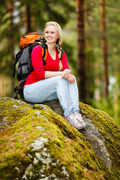 istock Young woman hiker on a break 500889837