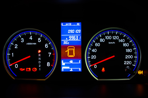 Modern Car Speedometer and Illuminated Dashboard