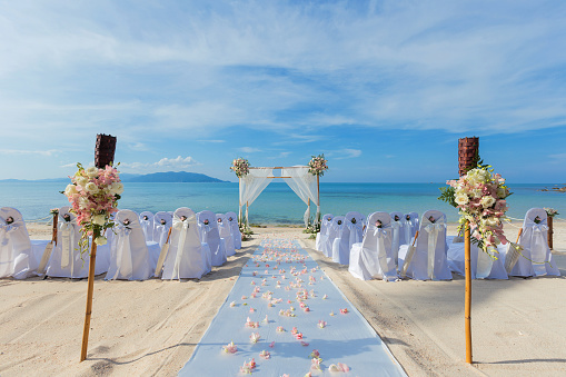 wedding flower setting on the beach
