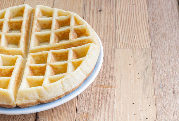 istock Full waffle with blue dish on the wooden background 500898730