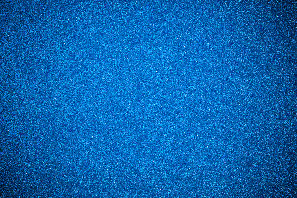 istock close up blue glitter paper background 500901530