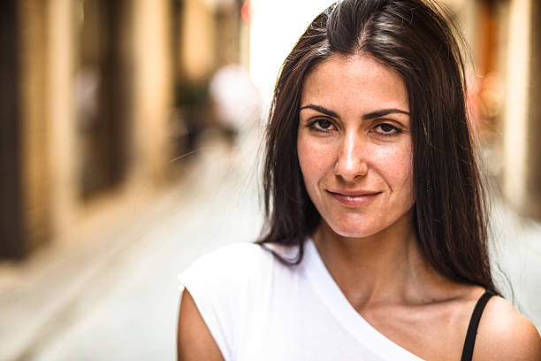 istock smiling woman on the city 500902456