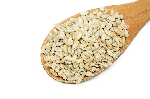 istock Sunflower seed with a wooden spoon. 500902564