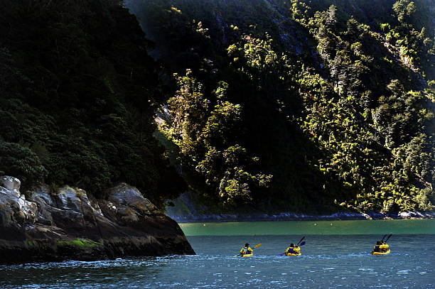 Canoeing on Fiordland national park in southern New Zealand.