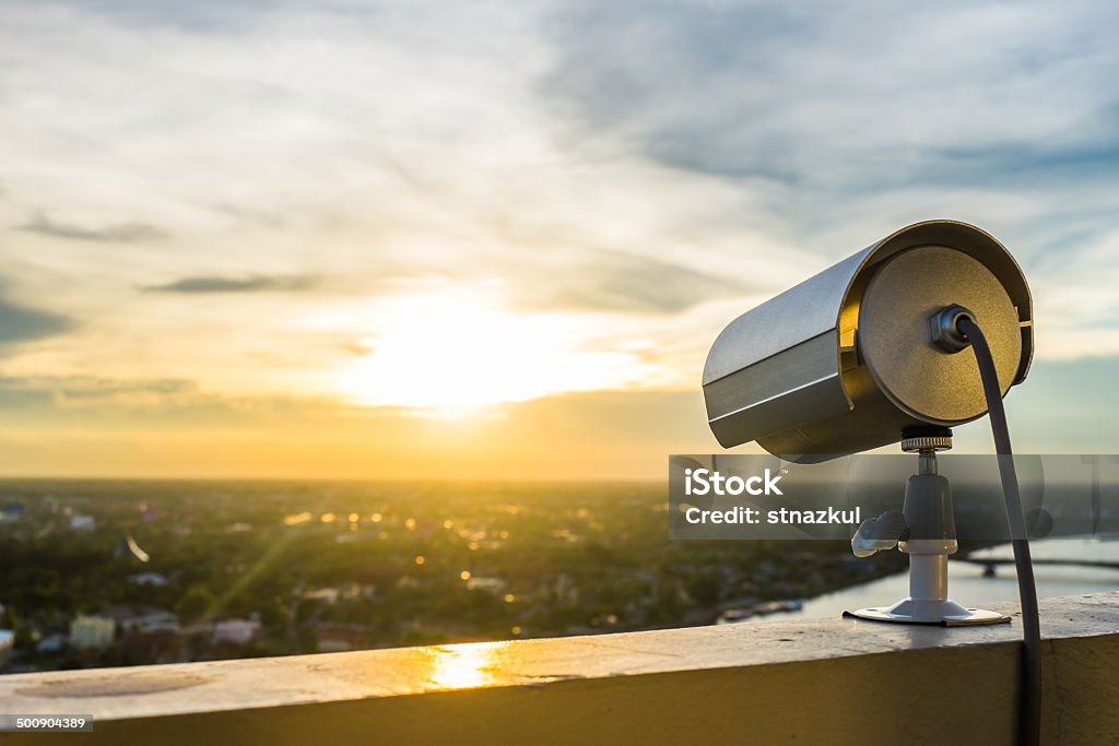 CCTV Camera or surveillance with sunlight Above Stock Photo