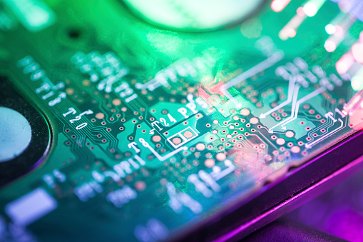 close up of circuit boards with fiber optics