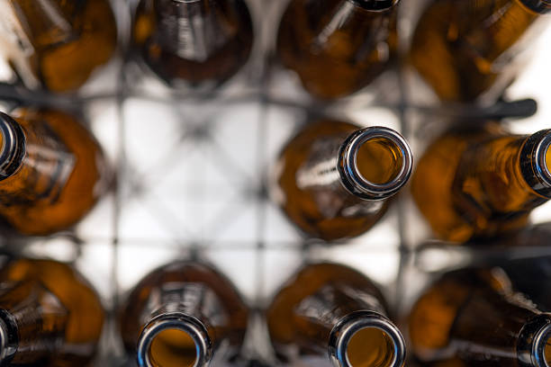 istock Rows of empty glass bottles in the plastic box 500905426