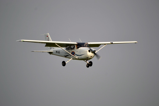 Single engine private plane (Aronca 7 AC) in flight.