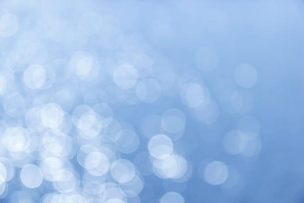 istock Abstract circular bokeh background of Light shining on the river 500906291