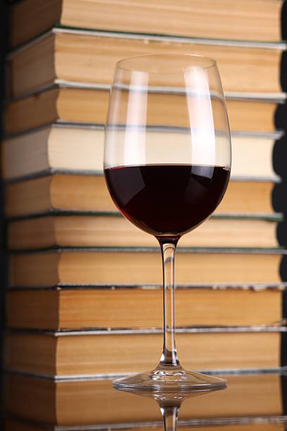 istock Wine glass and books 500907599