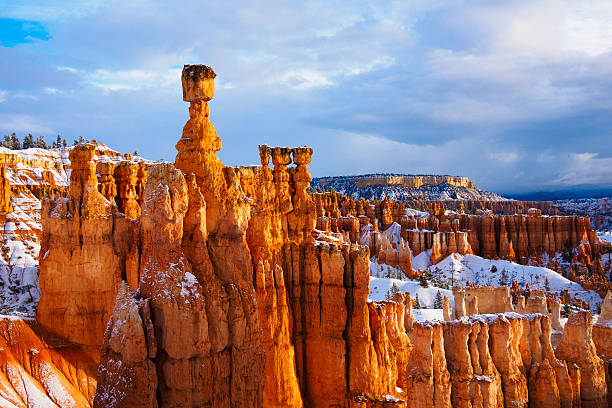 thor hammer over snow, Bryce Canyon National Park, UT USA thor hammer over snow, Bryce Canyon National Park, UT USA bryce canyon stock pictures, royalty-free photos & images