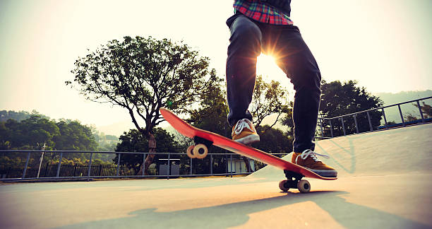 istock skateboarding at sunrise skatepark 500909456