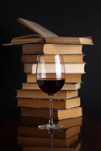 istock Wine glass and books 500910745