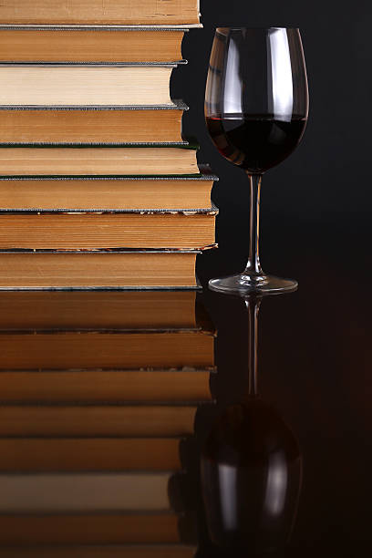 istock Wine glass and books 500910755