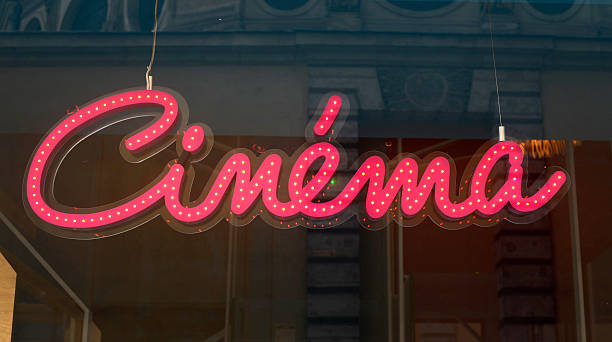 A Grungy Old Weathered Coming Soon Marquee Sign With Blue Letters