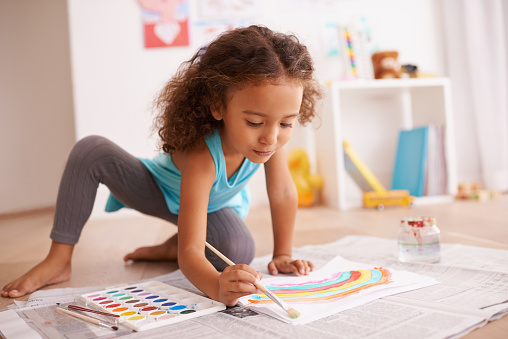 Shot of a little girl painting a picture of a rainbowhttp://195.154.178.81/DATA/i_collage/pi/shoots/783539.jpg