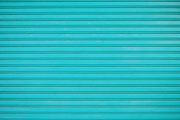 istock Close up blue metal sheet slide door texture background. 500924693